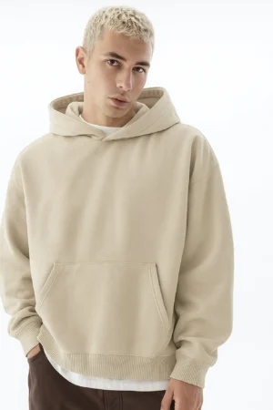 A person who wear beige hoodie